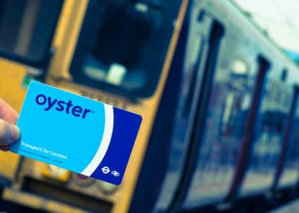 A man holding Oyster Card