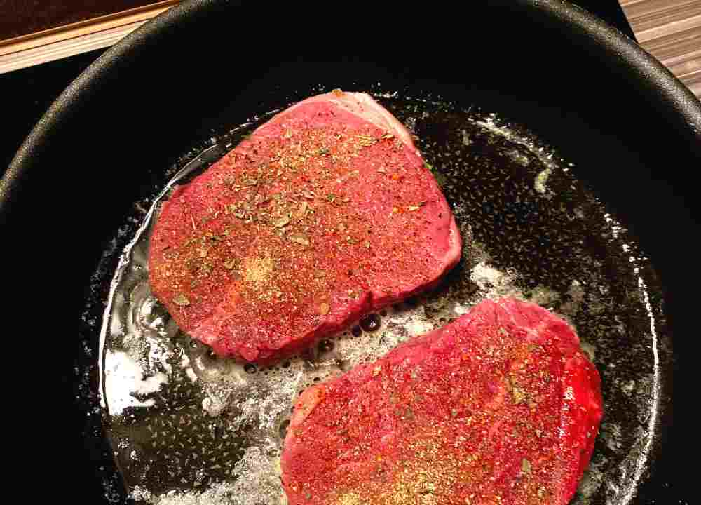 Two steaks in a fry pan
