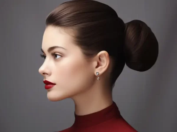 A woman with the Classic Low Bun hairstyle